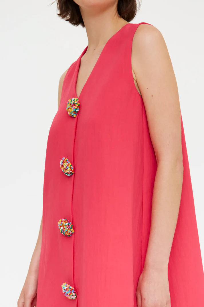Short fuchsia dress with multicolored buttons